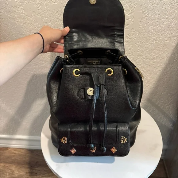 MCM Black Leather Backpack with Gold Accents - Picture 7 of 11
